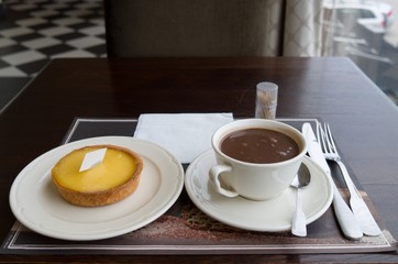 Lemon tart and hot chocolate