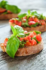 Wandaufkleber Italian tomato bruschetta with chopped vegetables © Titarenko
