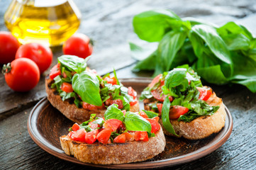 Italian tomato bruschetta with chopped vegetables
