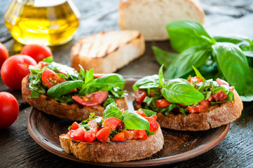 Italian tomato bruschetta with chopped vegetables