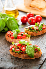 Italian tomato bruschetta with chopped vegetables