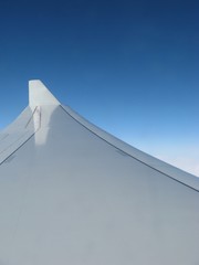 Airplane wing with flap standing up at the end