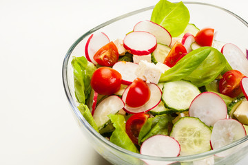 Fresh vegetable salad with cucumber and radish