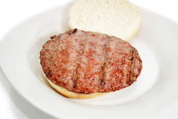 Grilled Burger Ready for Fresh Condiments