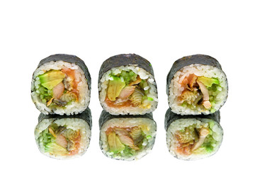 Japanese rolls with avocado and eel on white background