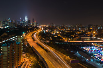 Night view of elevated busy highway heading towards Kuala Lumpur