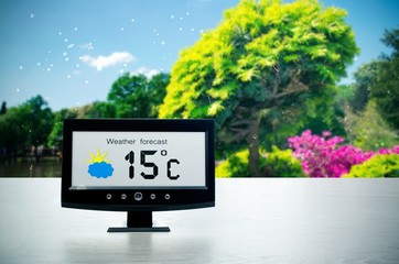 Weather station device with weather conditions outside backgroun