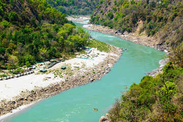 Holy Ganges river flows in a valley, India