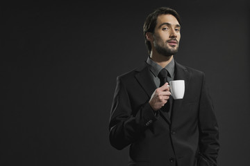 Junger Mann mit Kaffeetasse,Portrait