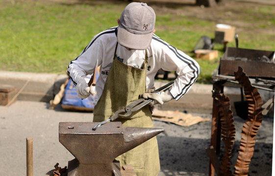 Young Blacksmith working