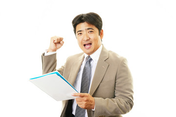 ガッツポーズのビジネスマン