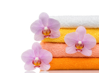 colorful towels and flower isolated on white