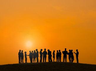 Silhouettes of Business People Working Outdoors