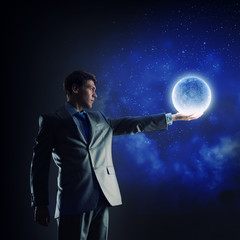 Businessman with moon