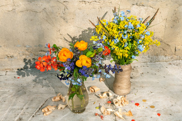 two yellow spring flowers still life bouquets