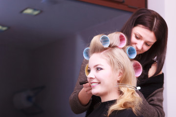 blond girl hair curlers rollers hairdresser beauty salon