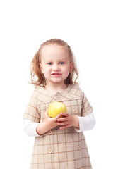 Fototapeta na wymiar Pretty little girl eating apple isolated on white
