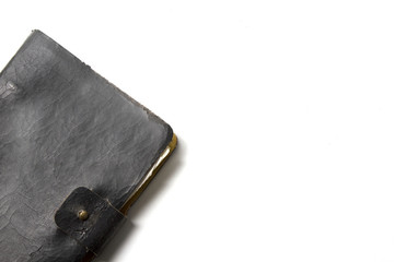 Old note book closed isolated on white background