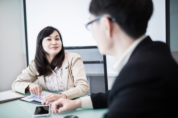 Successful young business executives meeting at the office