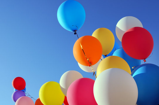 Fototapeta multicolored balloons in the city festival