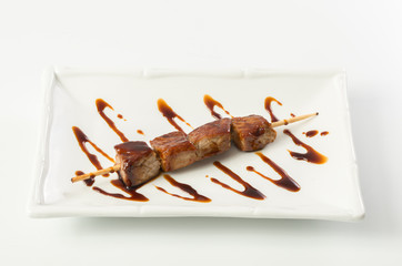 Grilled meat on a stick