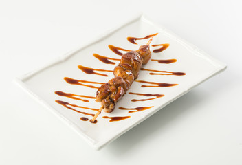 Grilled meat on stick