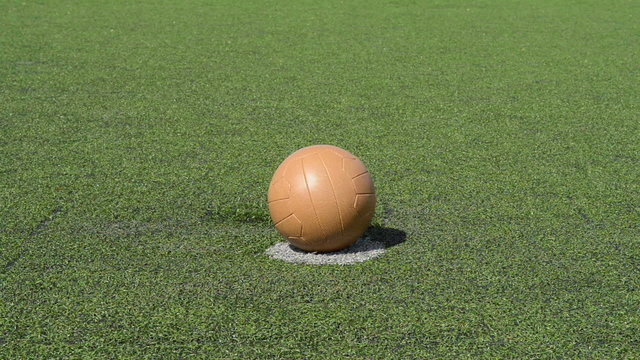 Businessman playing with soccer ball