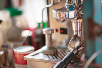 make coffee by Espresso americano Machine in coffee shop