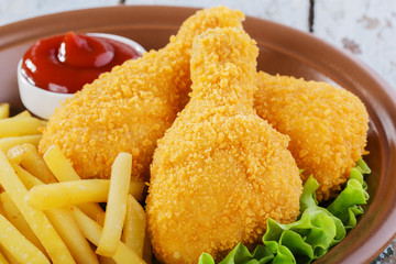 breaded chicken drumstick french fries leg