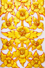 Art stucco Thailand golden flower with red border and white