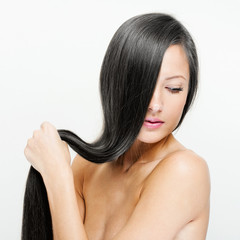 Fototapeta premium Beautiful Woman with Healthy Long Hair