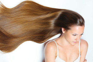 Fototapeta premium Beautiful Woman with Healthy Long Hair