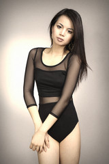 Nice Asian girl posing in studio