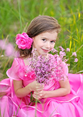 Fototapeta premium portrait of little girl outdoors in summer