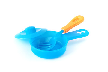 blue plastic toy pan with handle and spade of frying pan