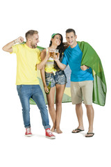 Fototapeta premium young group of brazil supporters cheering with Brazil flag