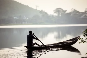 Gordijnen Fishermen on african lake © eunikas