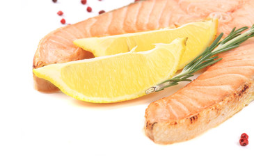 Fresh salmon steak with lemon and pepper.