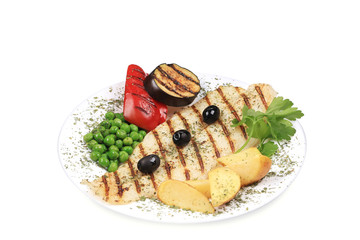Pangasius fillet grilled with vegetables.