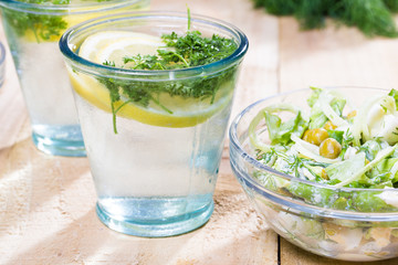 lemonade with parsley and bowl of vegetarian salad