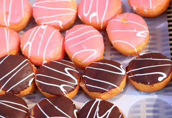 A lot of tasty chocolate donut