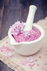Spa with sea salt and lilac flowers
