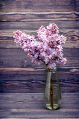 Lilac flowers in vase.Style nostalgia
