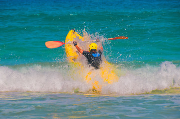 jump kayak through wave
