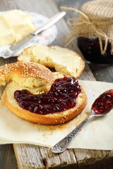 Bagel with jam and butter.