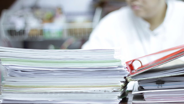 working in office with document