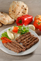 Cevapcici, a small skinless sausage cooked on the barbecue