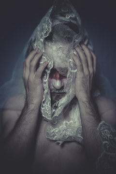 Physical, man with lace veil and bandages, wound concept, pain a