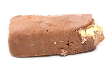 bitten off chocolate on white background