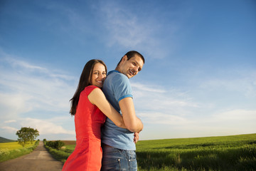 Couple in love on countryside road